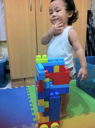 Baby Gab playing with Megabloks